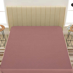 Dusty Rose Waterproof Mattress Protector โ Fitted Textured Design